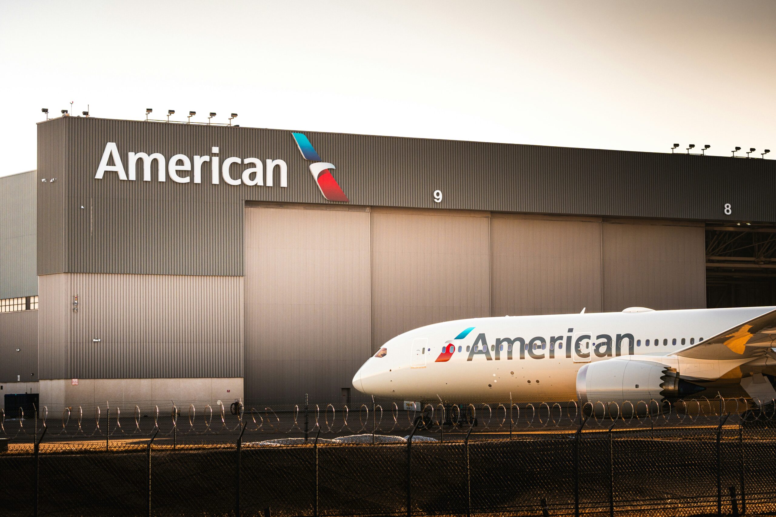 Wide-body aircraft in maintenance hangar